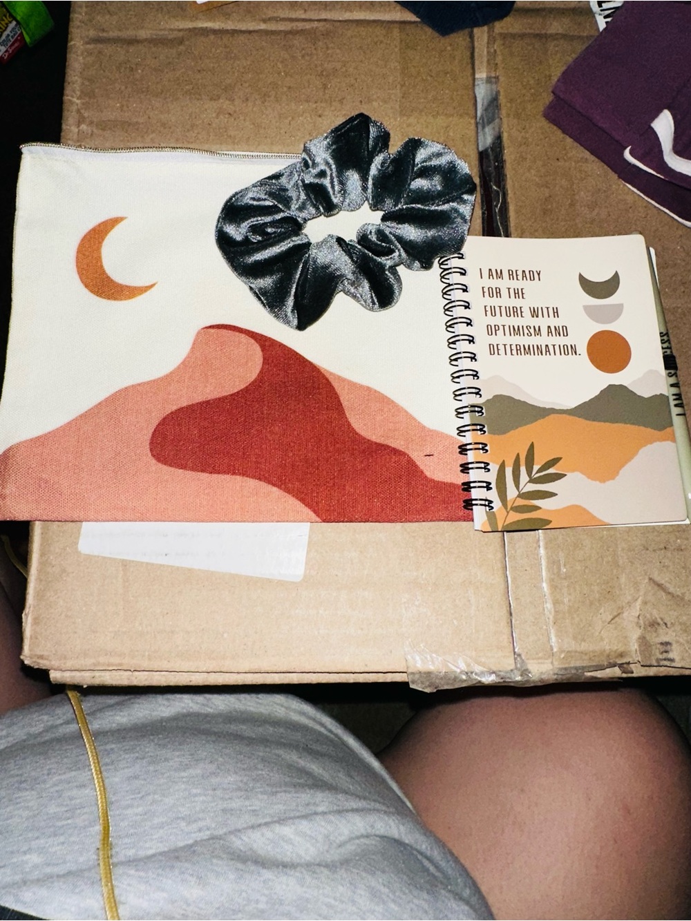 Makeup bag with notebook and scrunchie